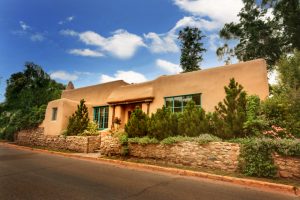Pueblo Revival home in Santa Fe showing traditional adobe construction