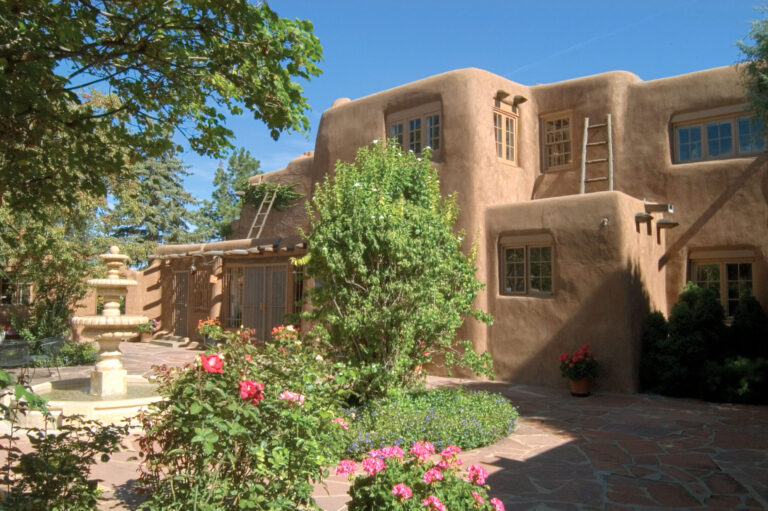Pueblo Revival adobe home in Santa Fe showing traditional Northern New Mexico architecture
