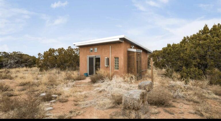 Straw bale guest house and studio in high desert grassland at 119 Old Galisteo, Santa Fe